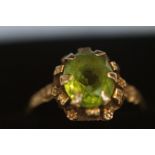 9ct Gold ring set with light green stone