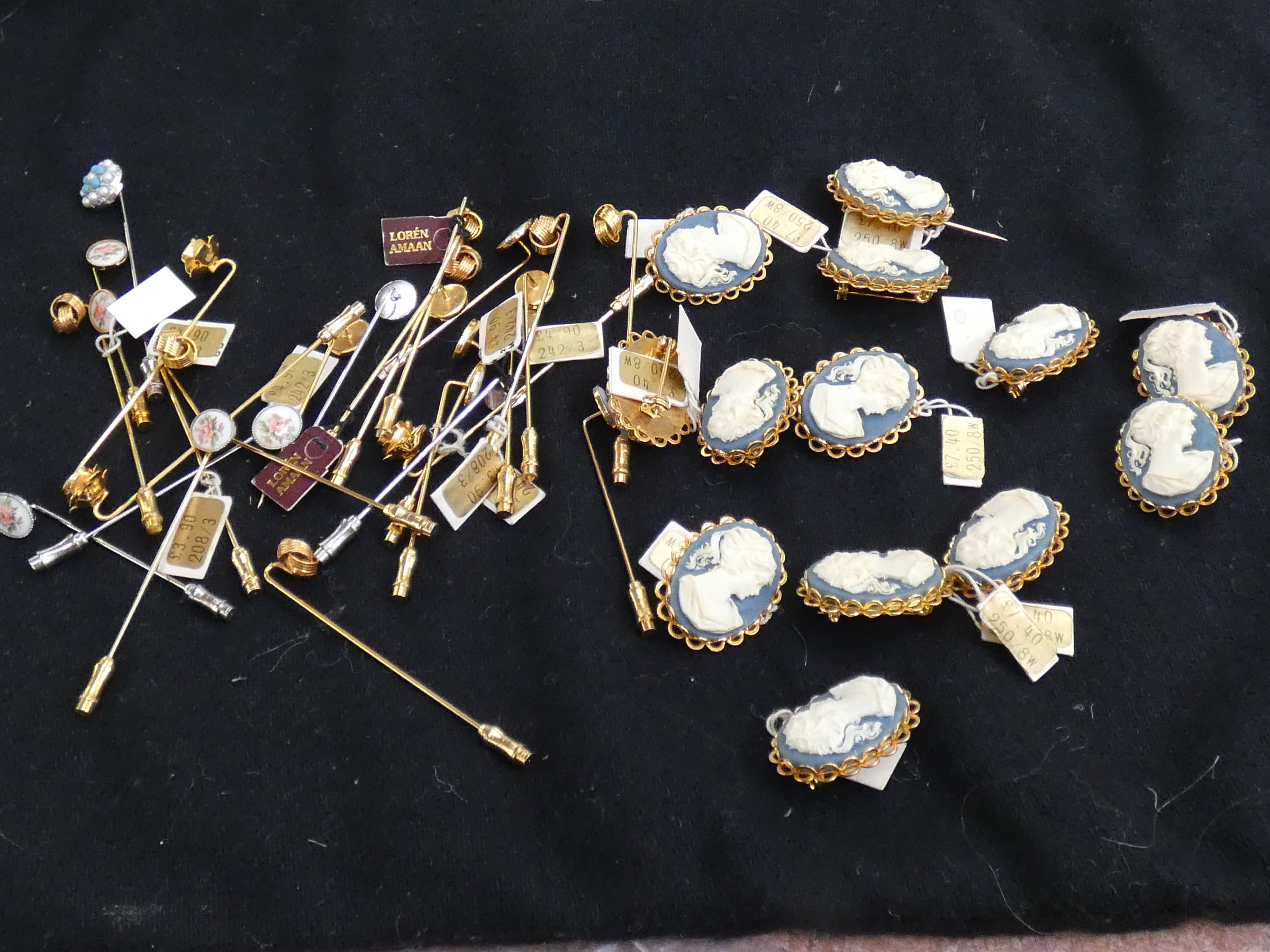 Collection of cameo brooches & stick pins