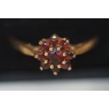 9ct Gold ring set with 9 garnets