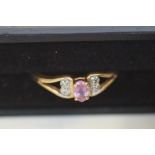 9ct Gold ring set with pink stone & diamonds