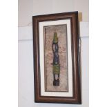 Framed African carved figure