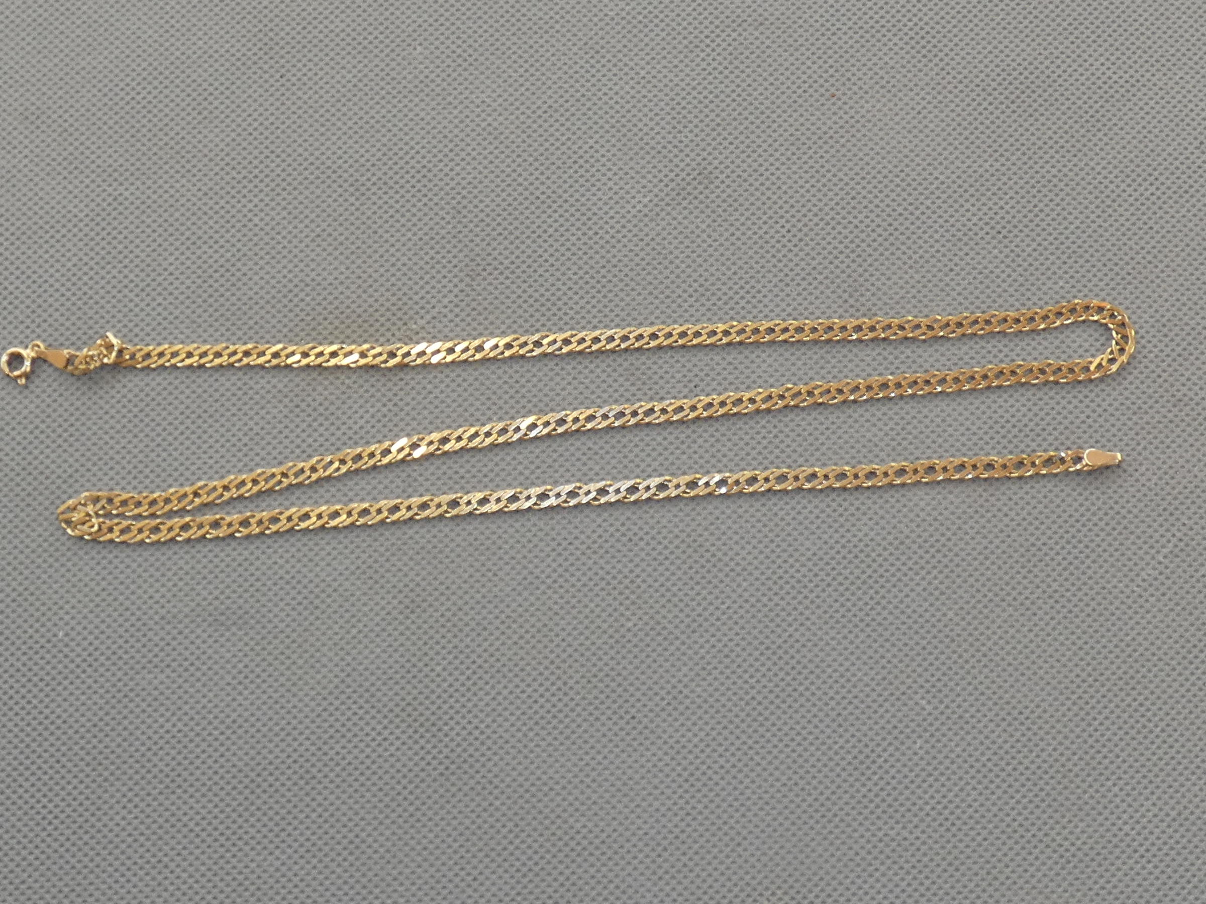 9ct Gold curb chain Length 23 inch Weight 9.7g