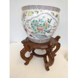 Large Chinese planter on wooden stand