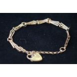 9ct Gold bracelet with safety chain & heart shaped