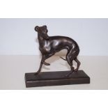 Metal grey hound figure on base