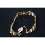 9ct Gold gate bracelet with safety chain & heart s