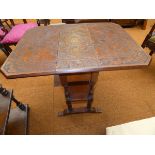 Small carved drop leaf table. 82 cm wide extended