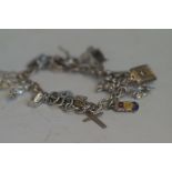 Silver charm bracelet with 15 charms