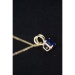 9ct Gold chain & sapphire pendant