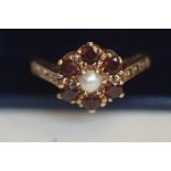 9ct Gold ring set with pearl & 6 ruby's