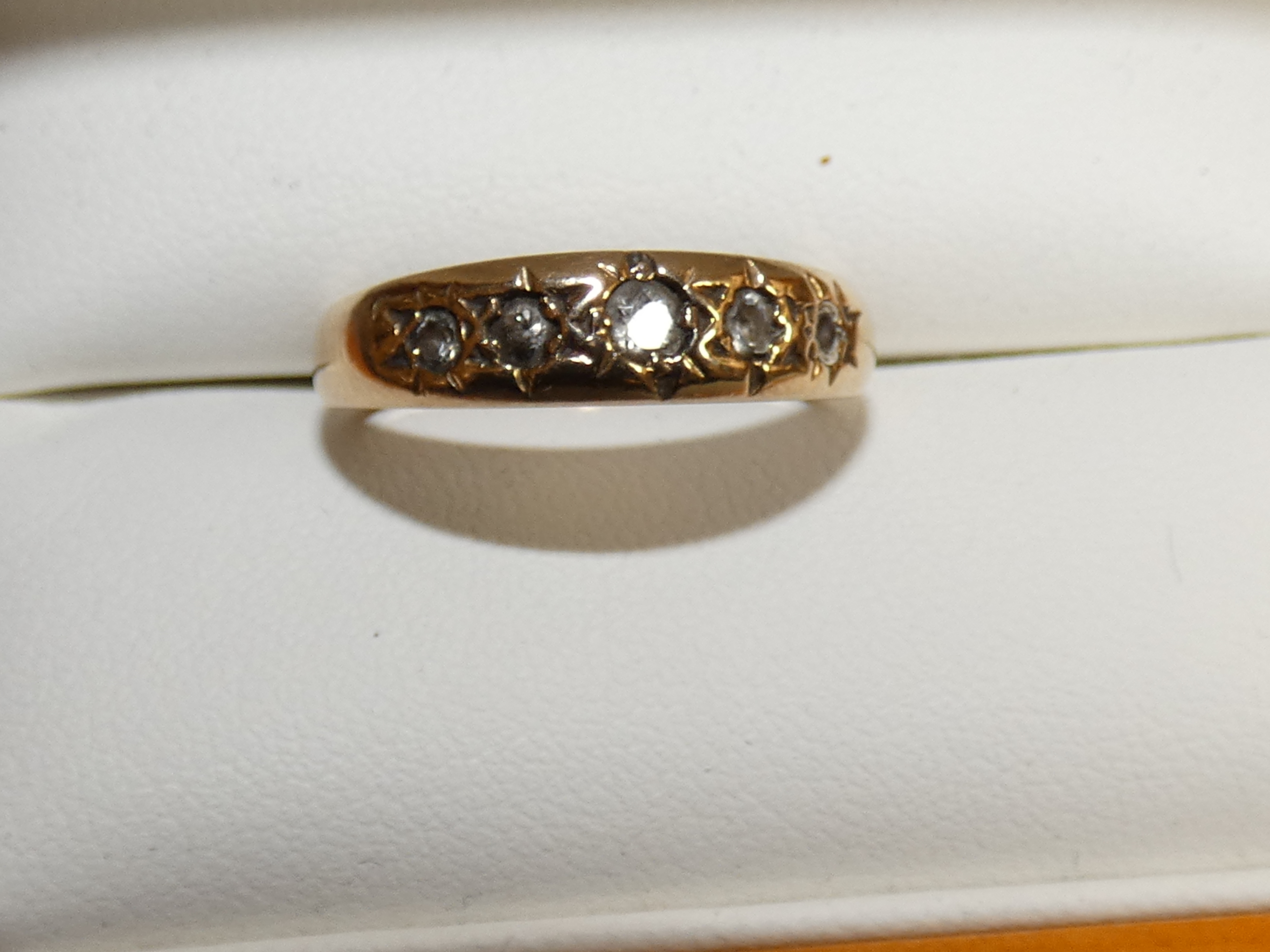 9ct Gold half eternity ring set with 5 white gem s