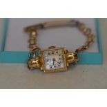 Ladies 18ct gold wristwatch currently ticking
