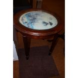 Glass topped coffee table with images of Trafalgar