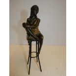 Bronze scantily clad seated lady Height 28 cm