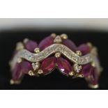 9ct Gold ring set with ruby's & diamonds