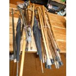 Large collection of walking sticks & shooting stic