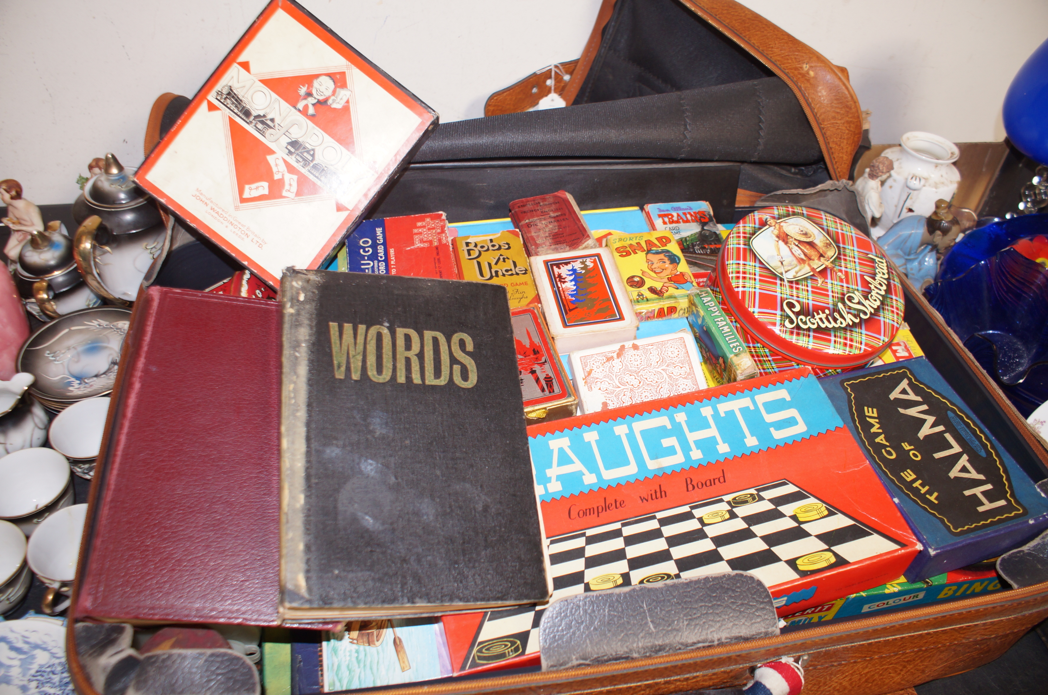 Very large suitcase of early games & cards