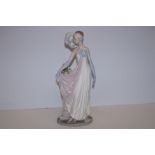 Lladro figure of a elegant lady Height 34 cm