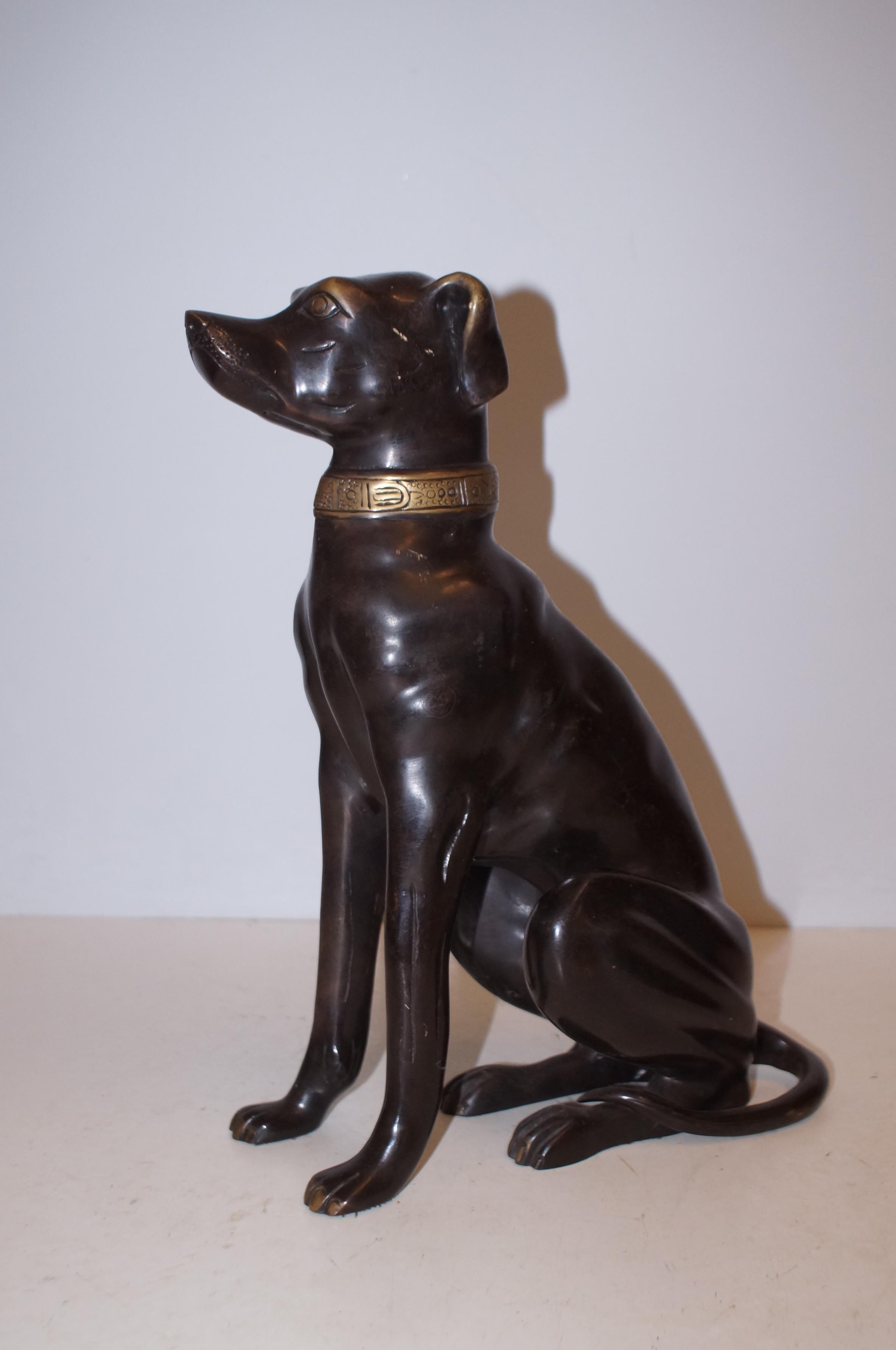 Bronze model of a seated dog Height 35 cm
