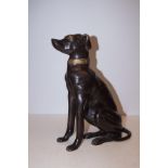Bronze model of a seated dog Height 35 cm