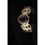 9ct Gold ring set with central garnet