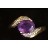 9ct gold ring set with amethyst and diamond