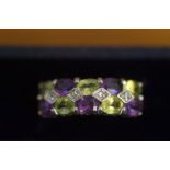 9ct gold ring set with diamonds and multicoloured