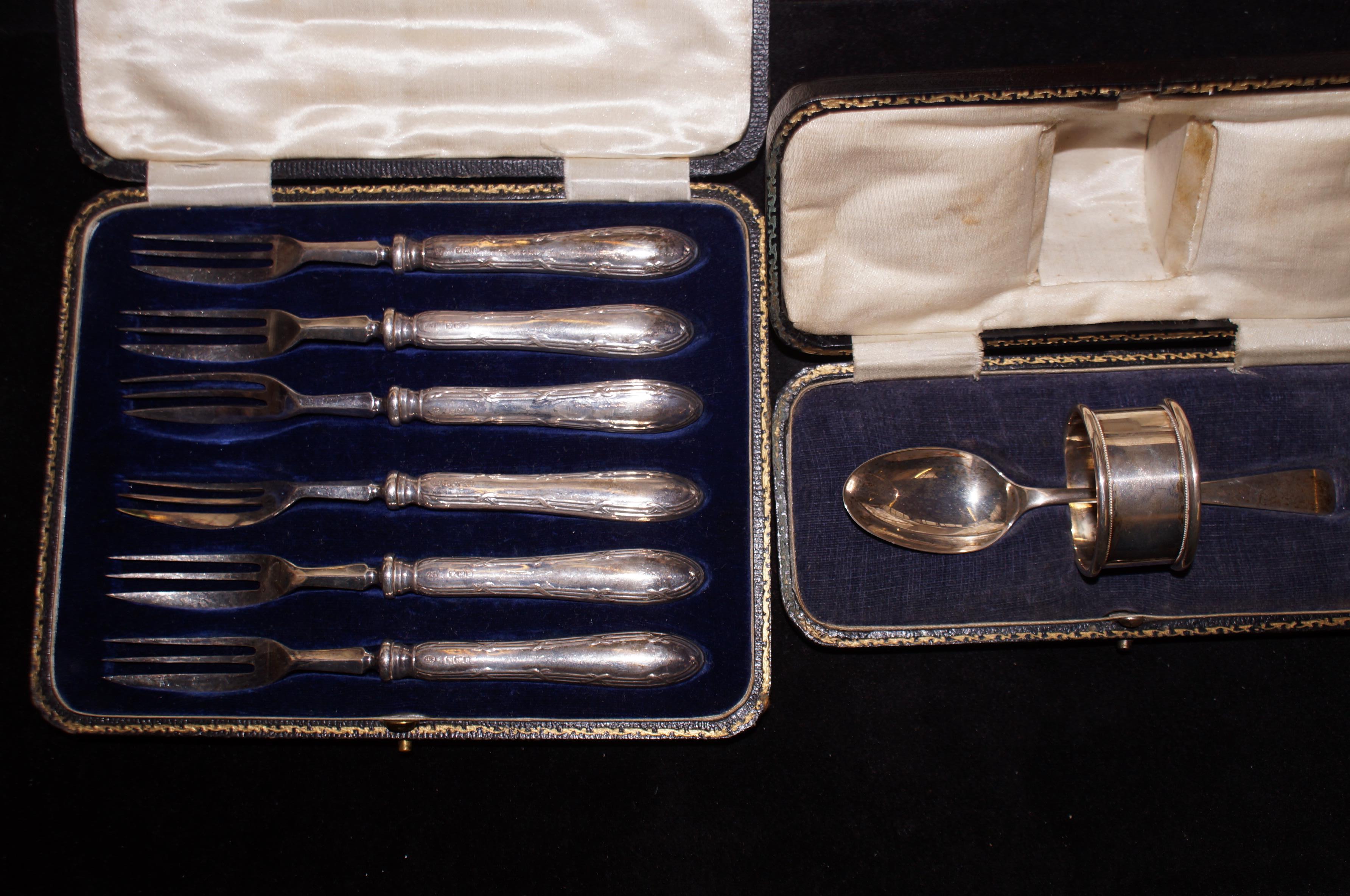 Silver christening set together with a cased silve