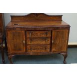 Four drawered sideboard with ball & claw feet. 120