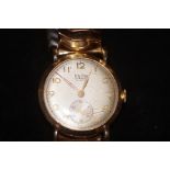 9ct Gold cased Baume 17 jewel gents wristwatch - C