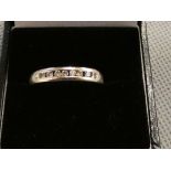 9ct White gold ring set with 8 diamonds Size P