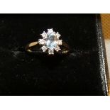 9ct Gold dress ring set with 8 diamonds & central