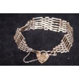 Silver gate bracelet with heart shaped lock