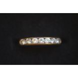 9ct Gold ring set with 7 stones