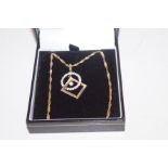 9ct Gold chain with double gold pendants