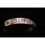 9ct Gold ring set with diamond & pink sapphires Si