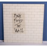 Pink Floyd a copy of The Wall with inner sleeves and stickered outer sleeve, VG+ to near mint