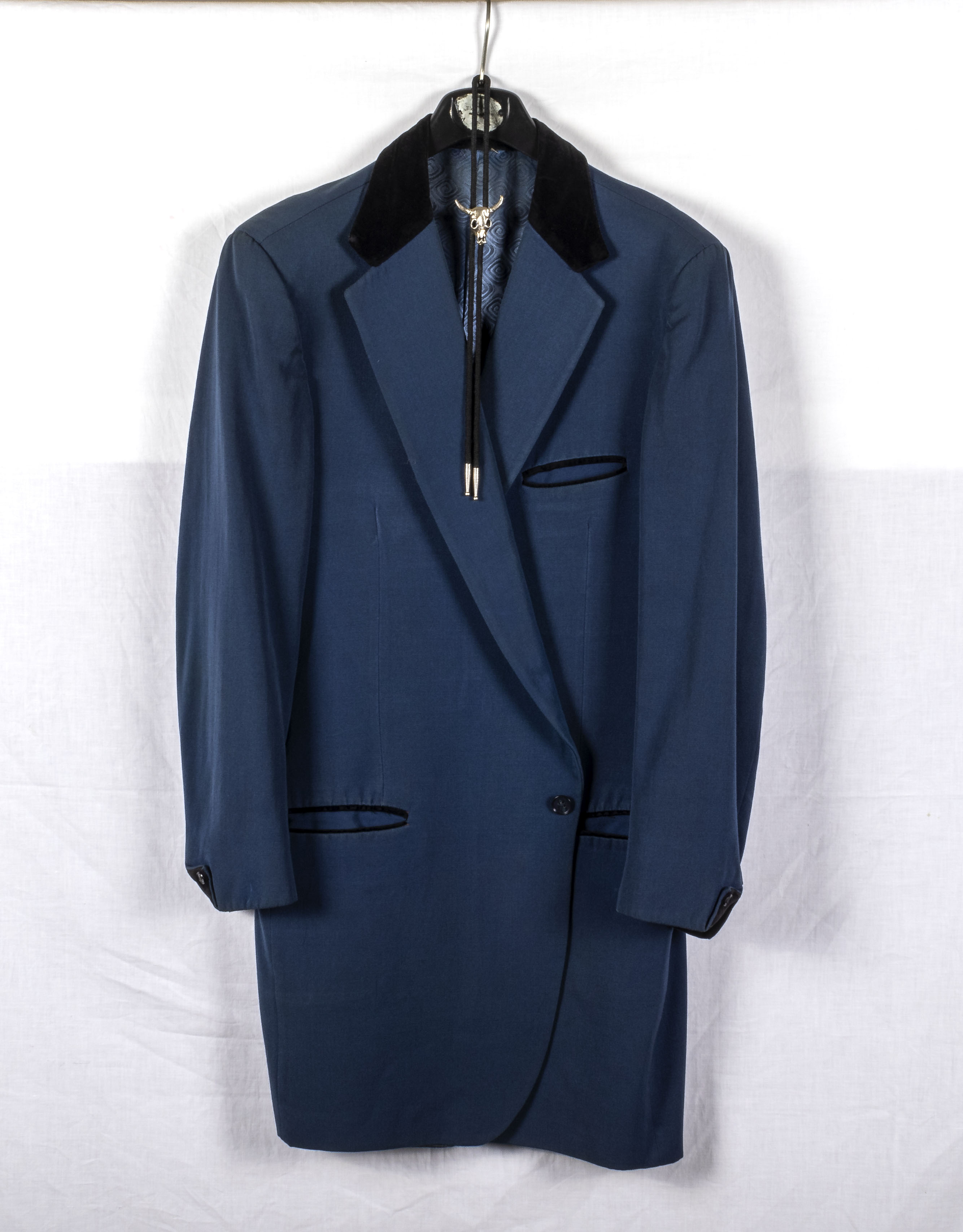 A gents 1950's style Teddy Boy drape jacket blue with dark blue collar and half back belt and a