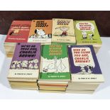 A large collection of Charlie Brown/Snoopy paperback books