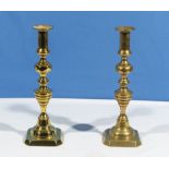 A pair of brass candlesticks