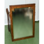 An oak framed mirror