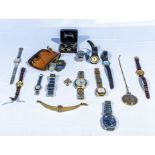 A collection of lady's and gents wrist watches together with coins and cuff links