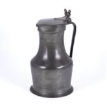 An early pewter wine pitcher with twin acorns on lid, possibly Channel Islands