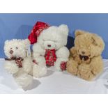 Three large teddy bears