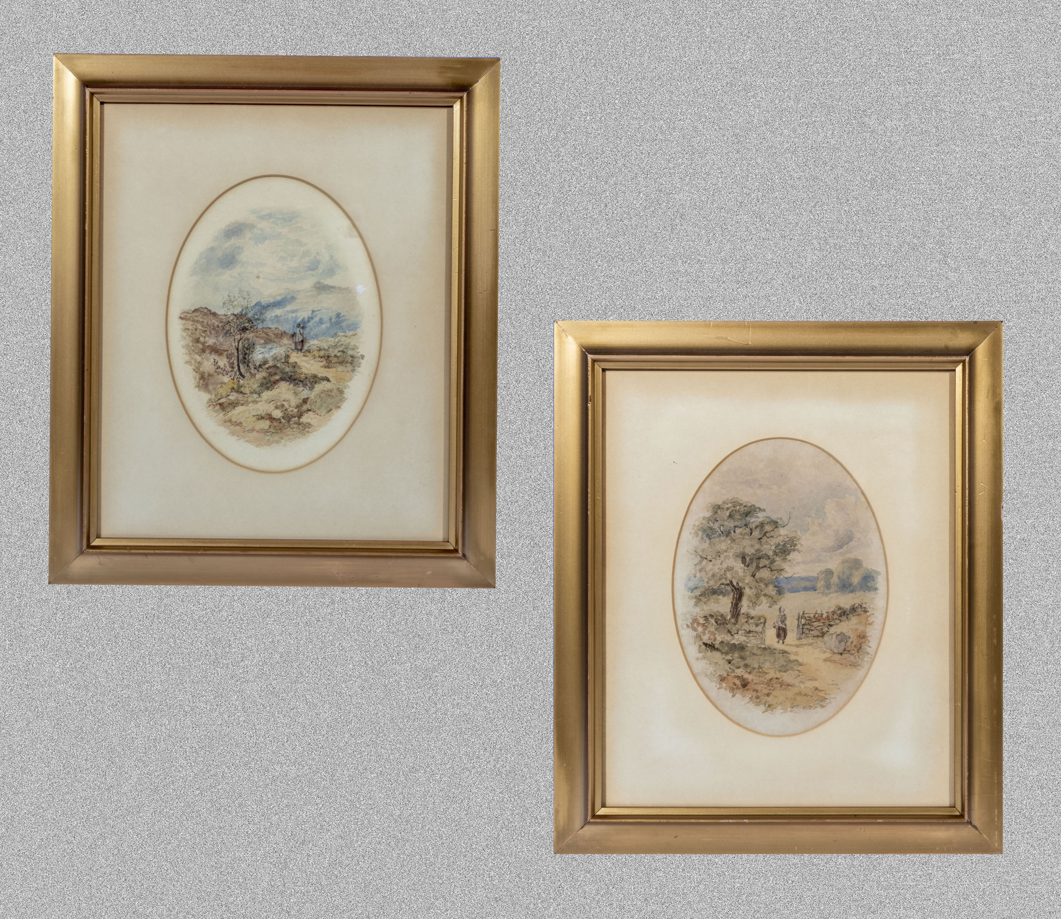 A pair of framed oval watercolours depicting rural scenes, image size 22cm x 16cm