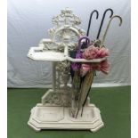 A Victorian white painted cast iron umbrella/stick stand