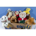 A box containing plush teddy bears and puppies