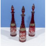 Three Bohemian cut glass decanters A/F