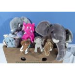 A box containing plush elephants