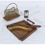 A small vintage letter rack, crumb tray and brush and an egg timer